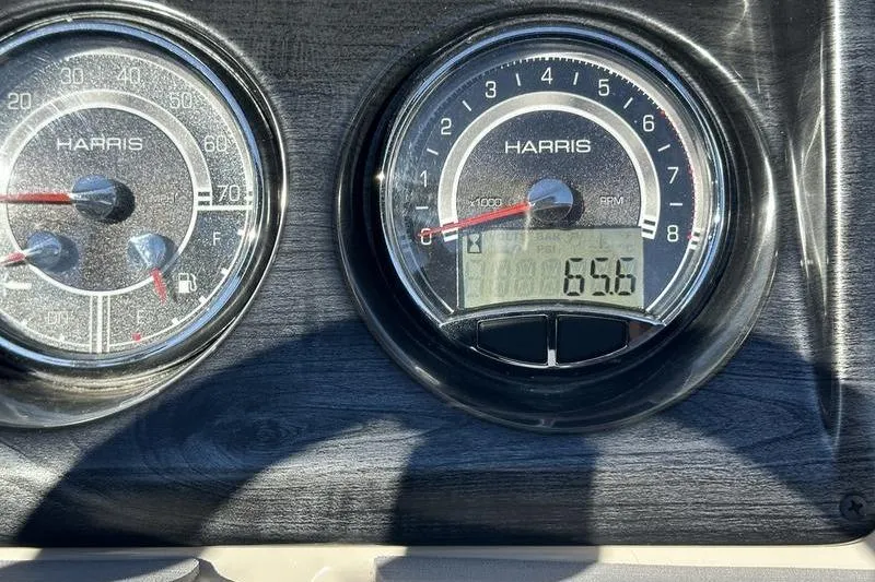 Slide: The Image of Close-up of 2023 Harris Cruiser 210 CS dashboard gauges. - 17