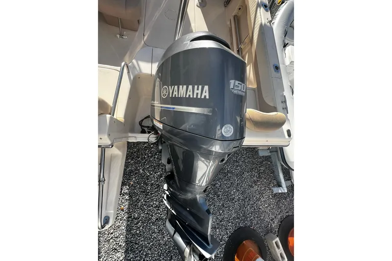 Slide: The Image of 2013 Grady-White Freedom 205 boat with Yamaha 150 outboard motor. - 11