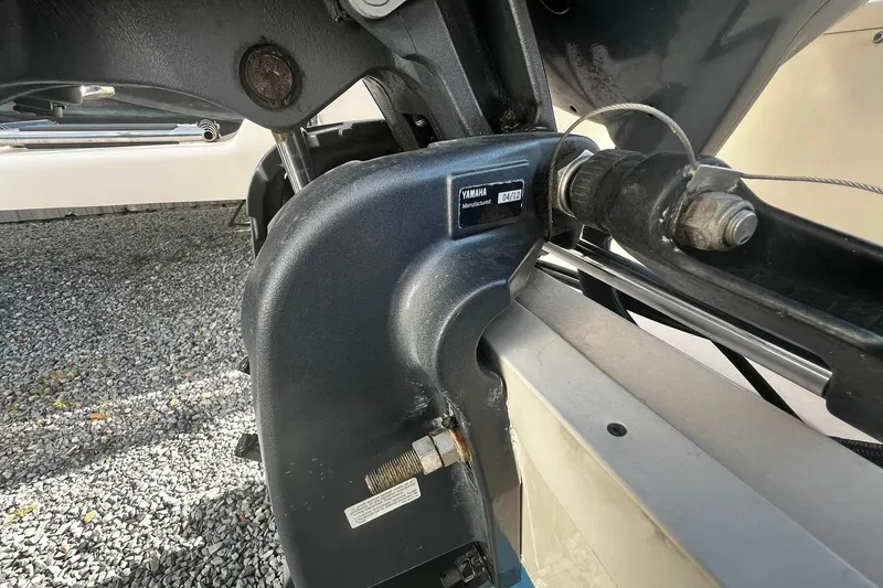 Slide: The Image of Close-up of a 2013 Grady-White Freedom 205 boat's Yamaha engine component. - 13