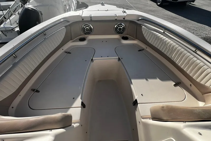 Slide: The Image of 2013 Grady-White Freedom 205 boat interior with seating and storage compartments. - 19