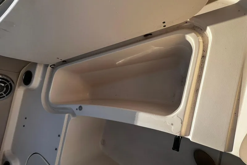 Slide: The Image of 2013 Grady-White Freedom 205 boat interior storage compartment. - 20