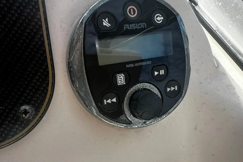 Slide: The Image of Fusion MS-WR600 marine stereo control on 2013 Grady-White Freedom 205 boat dashboard. - 27