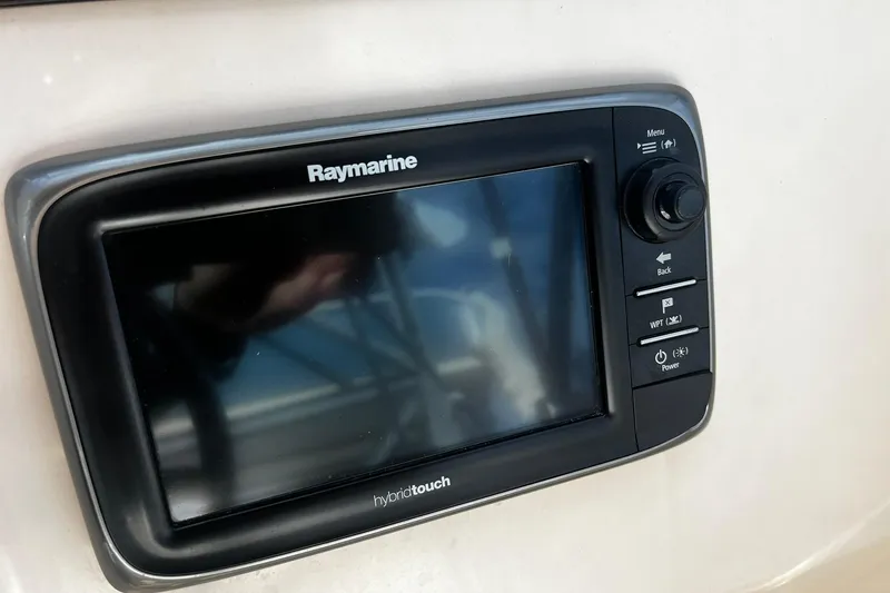 Slide: The Image of Raymarine HybridTouch display on 2013 Grady-White Freedom 205 boat dashboard. - 29