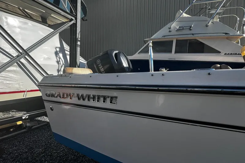 Slide: The Image of 2013 Grady-White Freedom 205 boat with Yamaha engine in storage. - 3