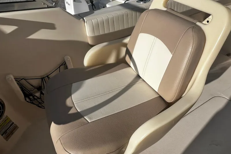 Slide: The Image of 2013 Grady-White Freedom 205 boat seat with beige and white upholstery. - 35