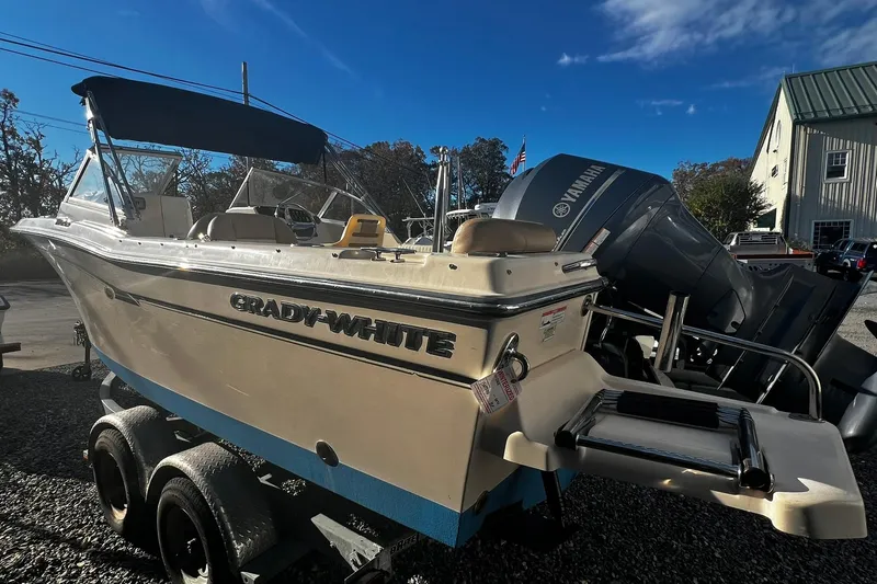 Slide: The Image of 2013 Grady-White Freedom 205 boat on trailer with Yamaha outboard motor. - 4