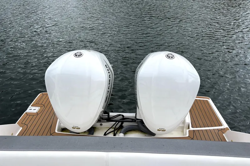 Slide: The Image of 2019 Tiara Sport 34 LS with twin Yamaha outboard engines on water. - 15