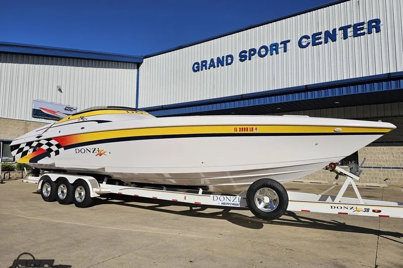 Slide: The Image of 2003 Donzi 38 ZX speedboat on trailer at Grand Sport Center. - 13