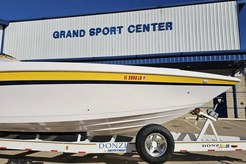 Slide: The Image of 2003 Donzi 38 ZX boat on trailer at Grand Sport Center. - 14