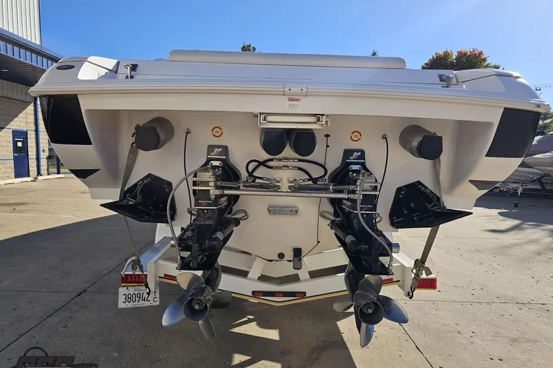 Slide: The Image of Rear view of a 2003 Donzi 38 ZX boat with dual propellers. - 27