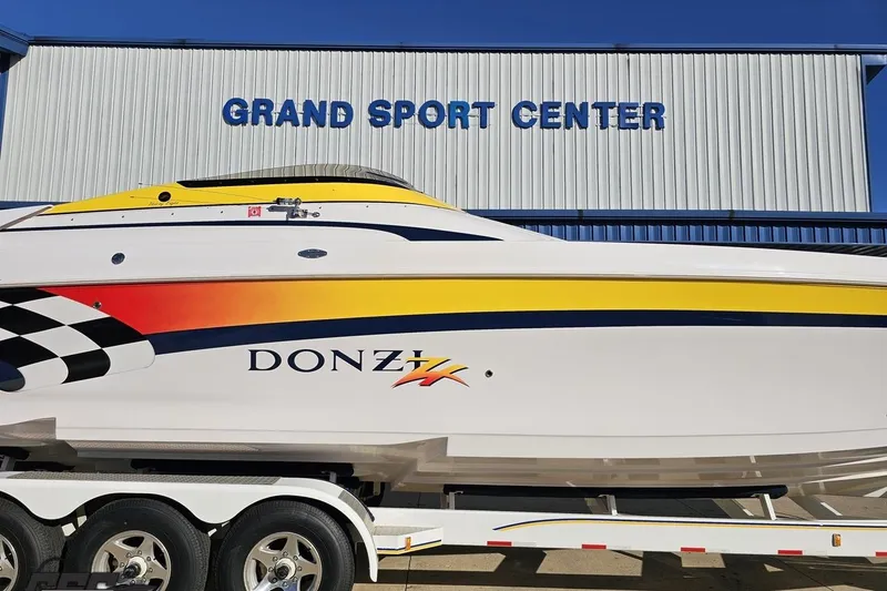 Slide: The Image of 2003 Donzi 38 ZX boat on trailer at Grand Sport Center. - 3