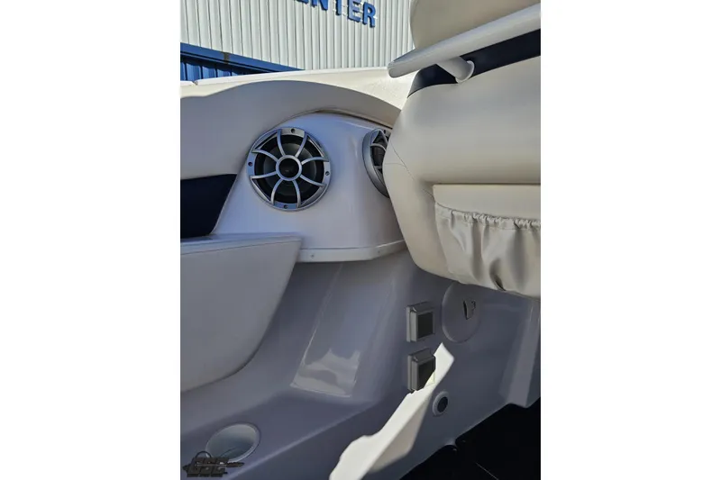 Slide: The Image of 2003 Donzi 38 ZX boat interior with speaker and seating detail. - 45