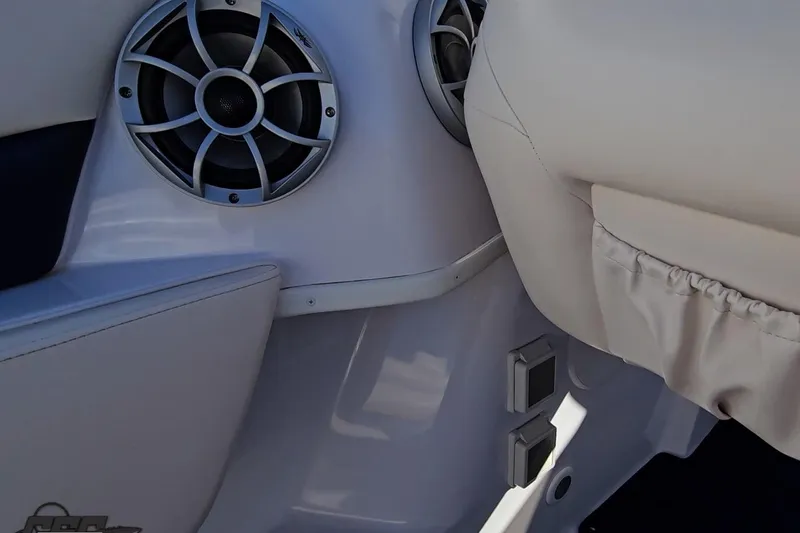 Slide: The Image of Interior of a 2003 Donzi 38 ZX boat featuring speakers and seating. - 46