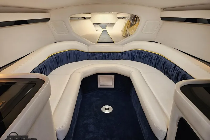 Slide: The Image of 2003 Donzi 38 ZX cabin interior with plush seating and elegant design. - 65