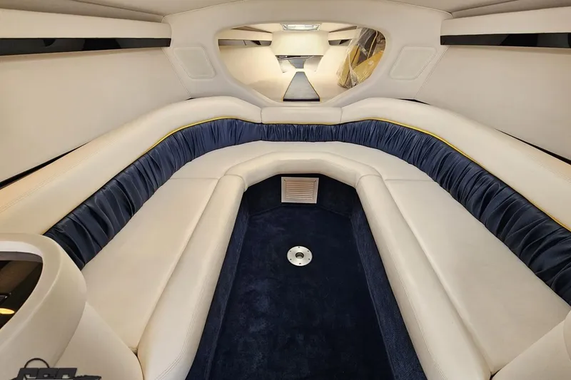 Slide: The Image of Interior of a 2003 Donzi 38 ZX boat, featuring luxurious seating and elegant design. - 77