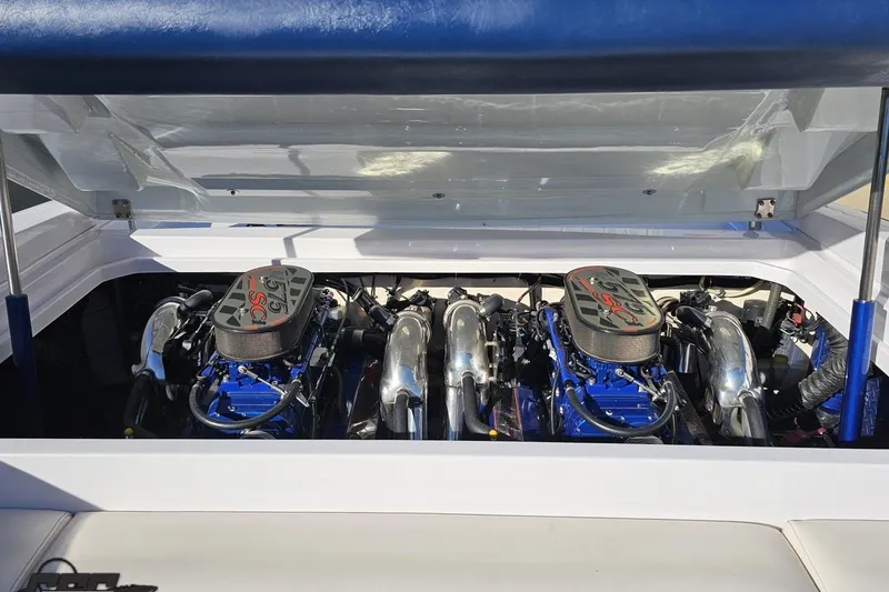 Slide: The Image of 2003 Donzi 38 ZX boat engine compartment with twin 575 SCi engines. - 94