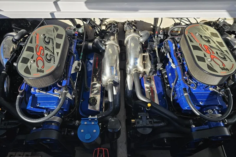 Slide: The Image of Twin engines of a 2003 Donzi 38 ZX boat, showcasing powerful 575 SCi motors. - 95