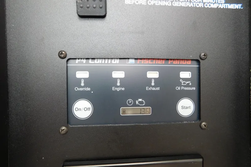 Slide: The Image of Fischer Panda control panel on 2024 Pursuit DC 326 Dual Console boat. - 81