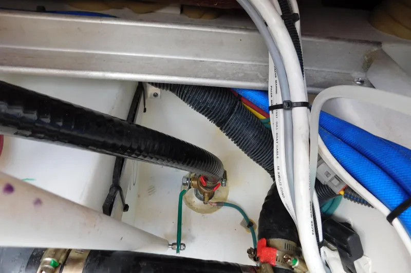 Slide: The Image of 2024 Pursuit DC 326 Dual Console boat wiring and plumbing details. - 85