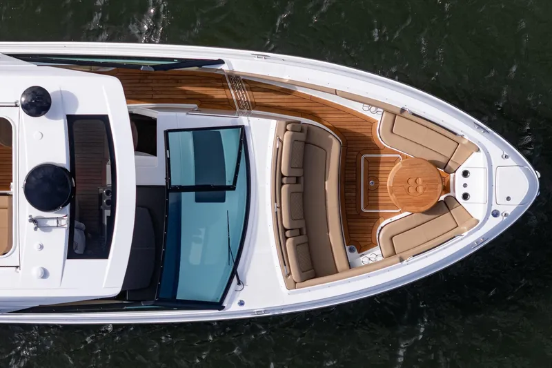 Slide: The Image of 2023 Sea Ray SLX 400 Outboard boat, aerial view, luxurious deck seating. - 7