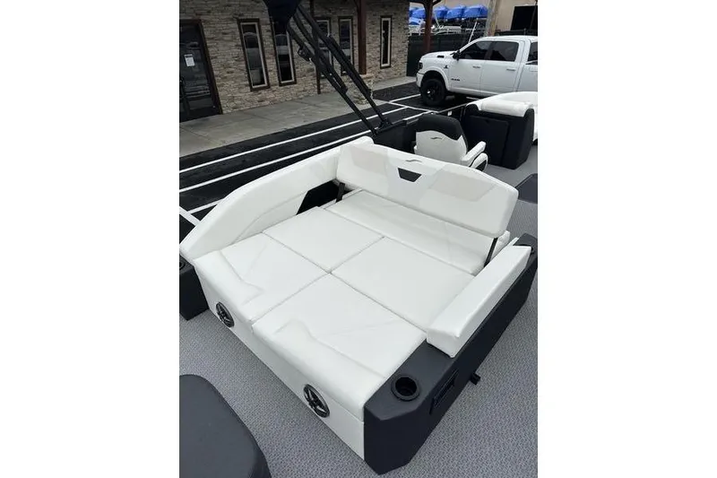 Slide: The Image of 2026 Evotti 523CS boat with white cushioned seating and modern design. - 15