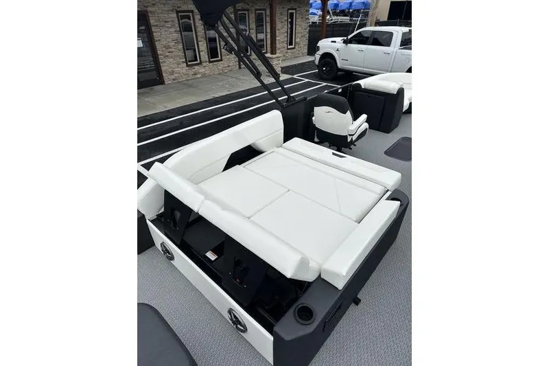 Slide: The Image of Evotti 523CS 2026 boat interior with white seating and modern design. - 16