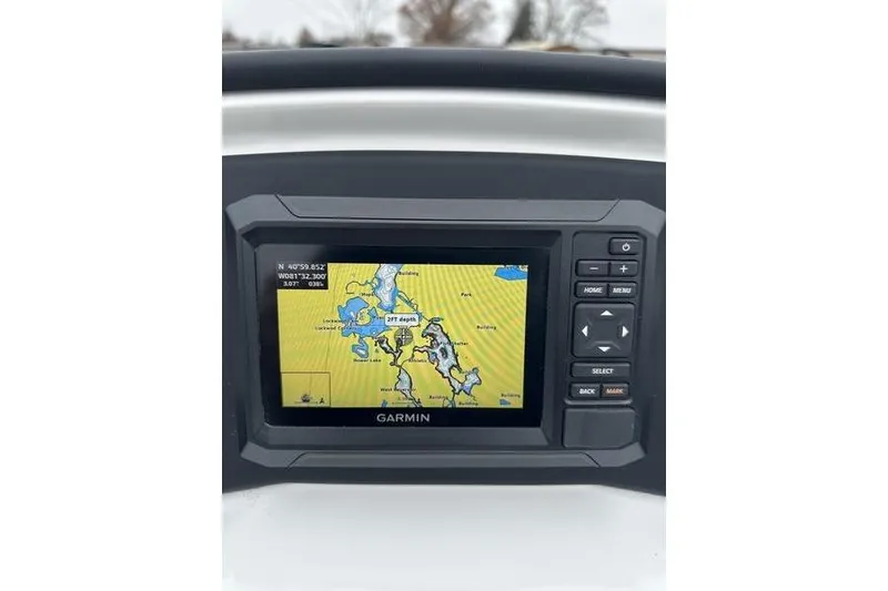 Slide: The Image of Garmin navigation display in 2026 Evotti 523CS boat, showing detailed map. - 28