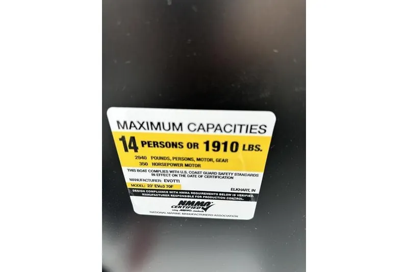 Slide: The Image of Evotti 523CS 2026 boat capacity label: 14 persons or 1910 lbs, 350 horsepower. - 4