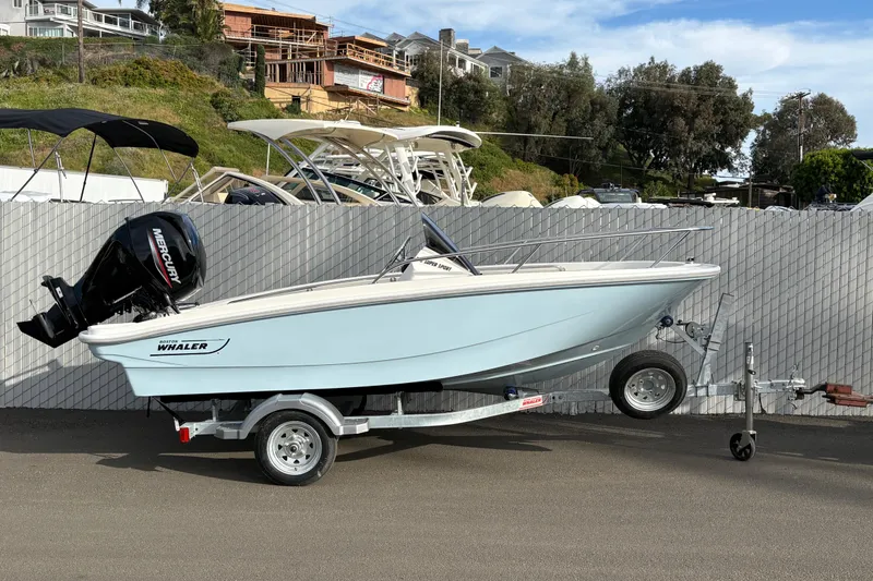 The Image of 2026 Boston Whaler 130 Super Sport on trailer, side view. - 0