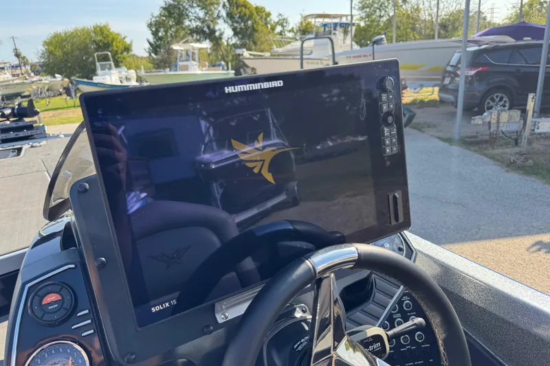 Slide: The Image of 2023 Vexus VX20 boat dashboard with Humminbird Solix 15 display. - 21