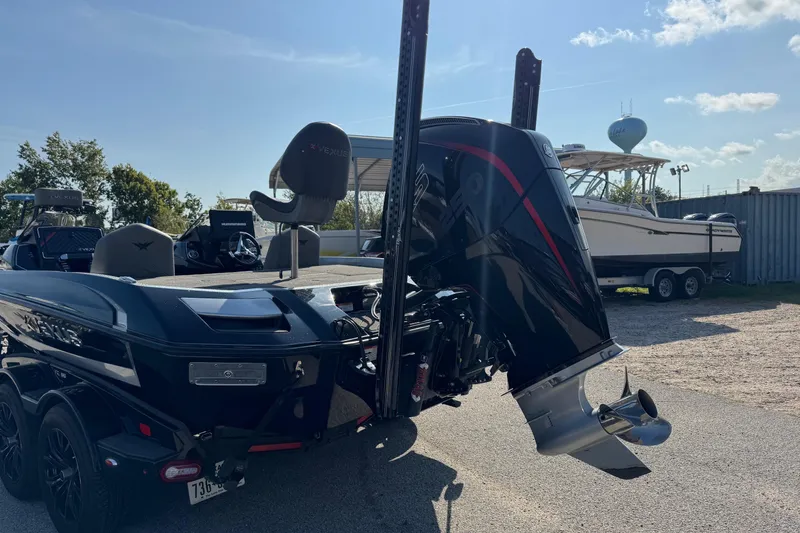 Slide: The Image of 2023 Vexus VX20 boat with powerful outboard motor in a sunny outdoor setting. - 6