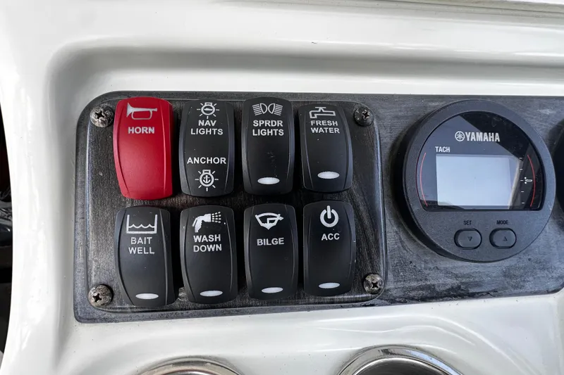 Slide: The Image of Control panel of a 2008 Sailfish 3006 boat with Yamaha tachometer. - 11