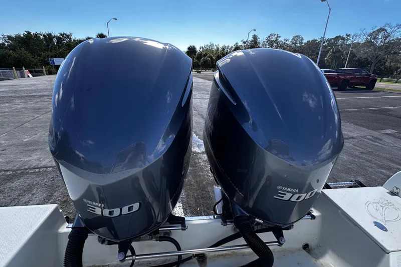 Slide: The Image of Twin Yamaha 300 outboard engines on a 2008 Sailfish 3006 boat. - 5