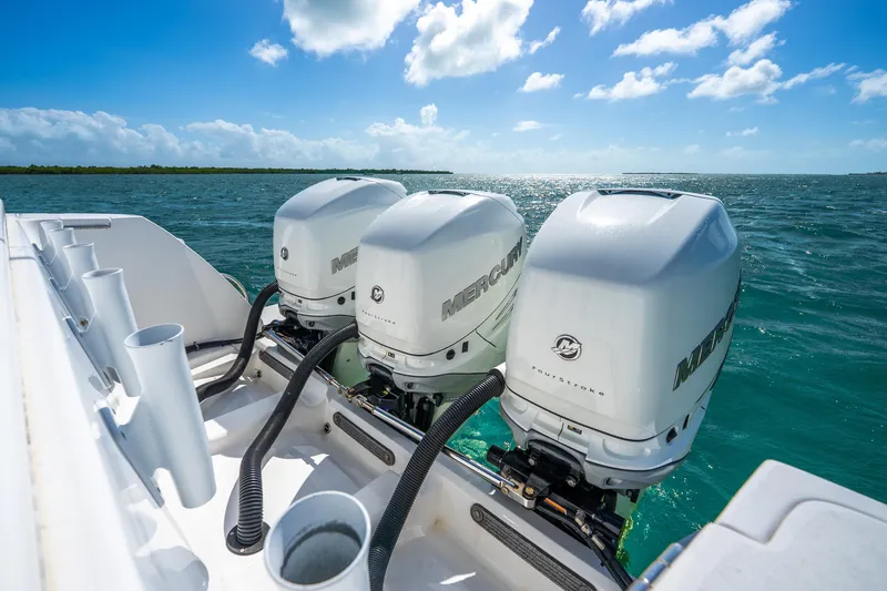 Slide: The Image of Overhead view of 2016 Intrepid 400 Center Console boat on turquoise water. - 16