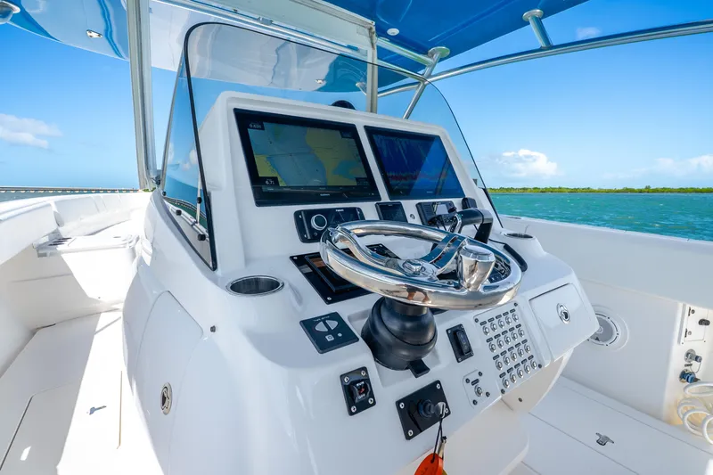 Slide: The Image of 2016 Intrepid 400 Center Console helm with advanced navigation displays and controls. - 20