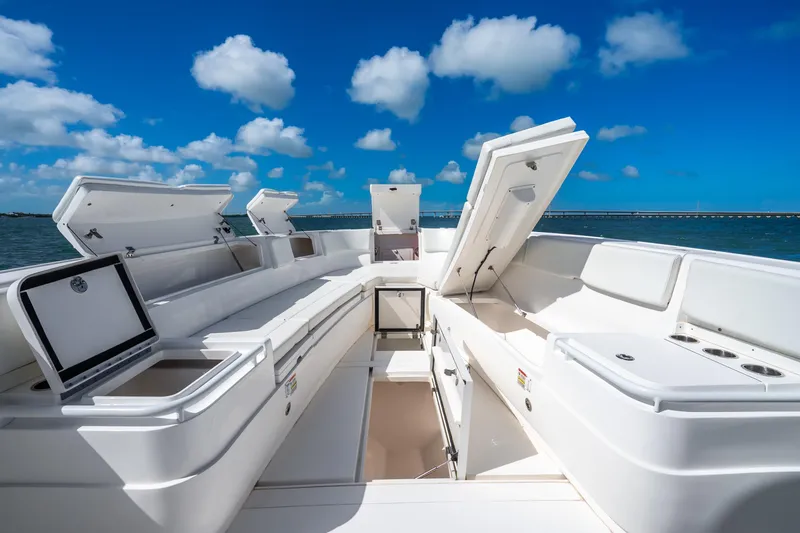 Slide: The Image of 2016 Intrepid 400 Center Console boat interior with open storage compartment. - 30