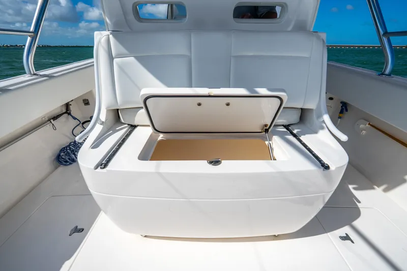 Slide: The Image of 2016 Intrepid 400 Center Console boat on open water under clear blue sky. - 39