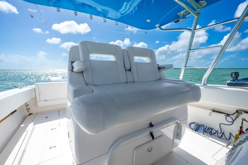 Slide: The Image of 2016 Intrepid 400 Center Console boat with open storage compartments on deck. - 42