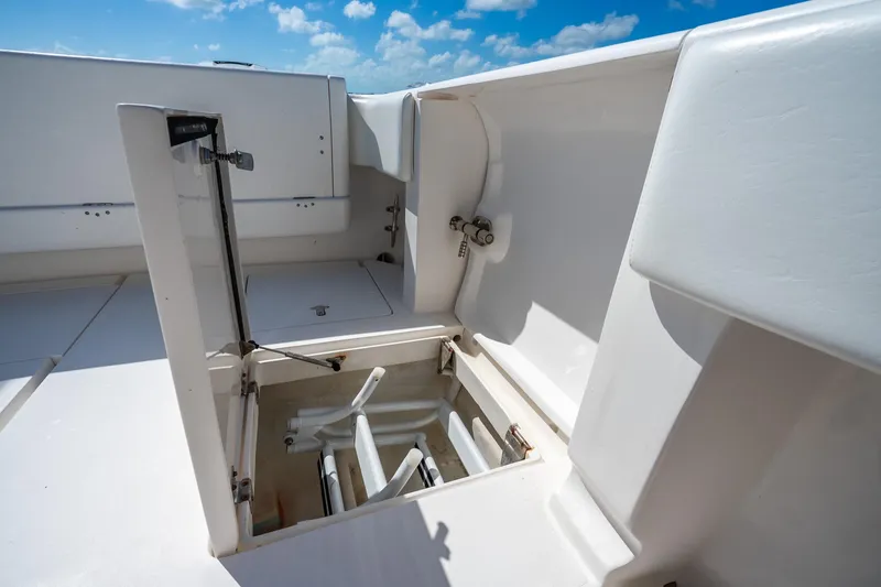 Slide: The Image of 2016 Intrepid 400 Center Console interior with white seating and control panel. - 50