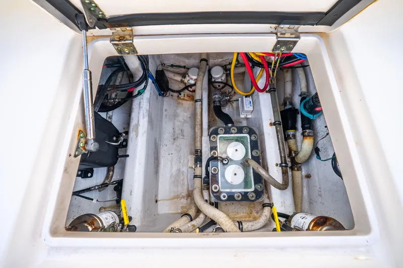 Slide: The Image of Open storage compartment on 2016 Intrepid 400 Center Console boat. - 53