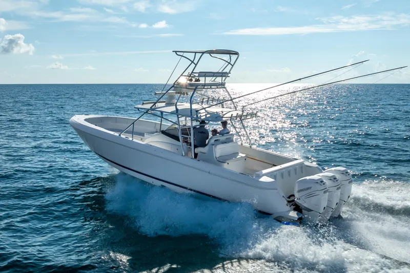 Slide: The Image of Aerial view of 2016 Intrepid 400 Center Console boat cruising on green water. - 64