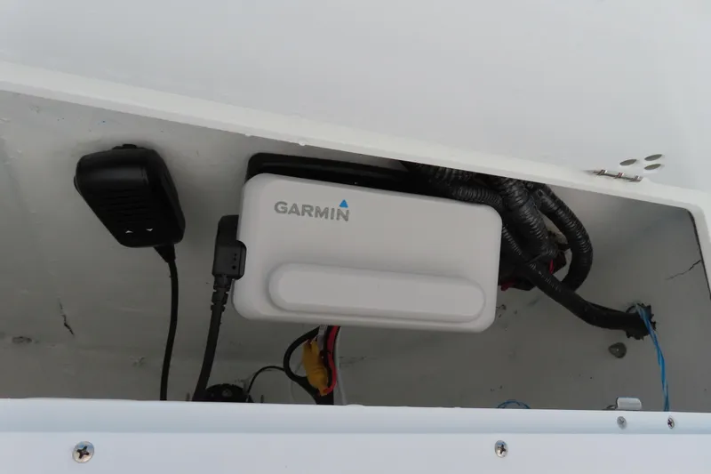 Slide: The Image of Garmin device installed in 2025 Sea Hunt Ultra 229 boat compartment. - 27