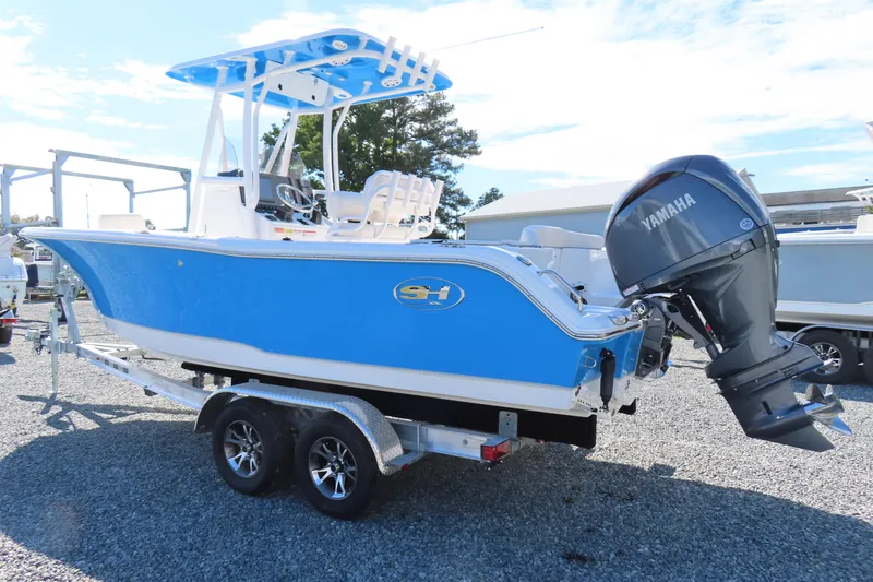 Slide: The Image of 2025 Sea Hunt Ultra 229 boat with Yamaha engine on trailer. - 3