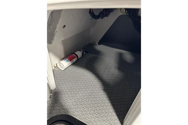 Slide: The Image of Interior of 2026 Evotti 723CS showing a fire extinguisher on patterned flooring. - 13