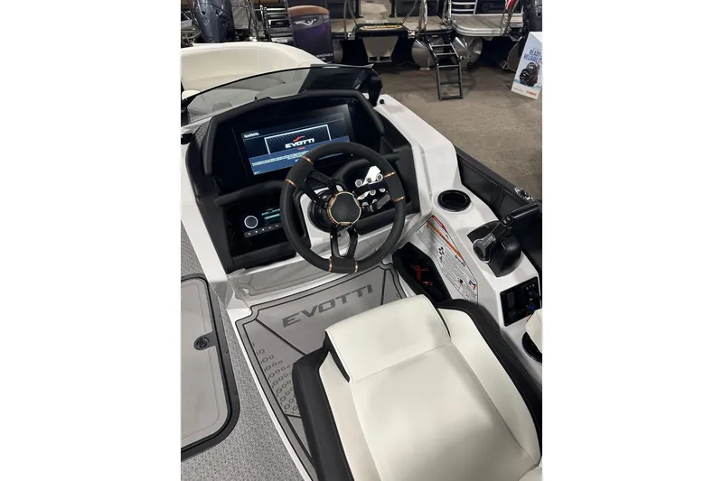 Slide: The Image of Interior of 2026 Evotti 723CS boat, featuring modern steering and dashboard controls. - 17