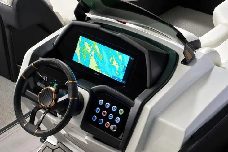 The Image of 2026 Evotti 723CS pontoon boat with sleek black design and white seating in showroom. - 2