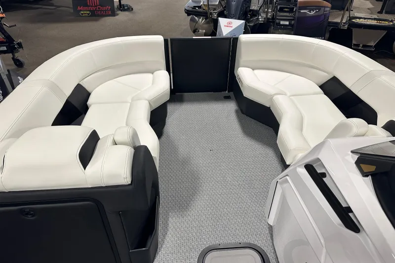 Slide: The Image of Luxurious seating inside 2026 Evotti 723CS boat, featuring white and black upholstery. - 9