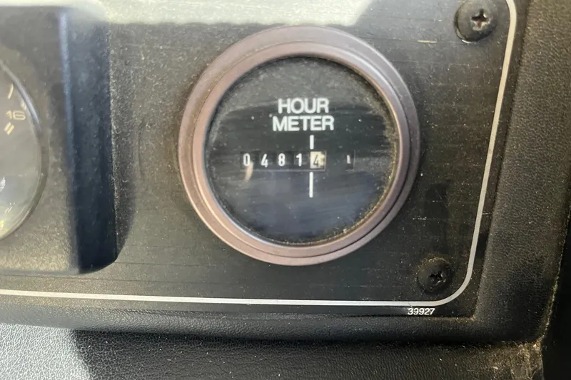 Slide: The Image of Hour meter reading 4814 on 1989 Bayliner 3888 MY Sedan dashboard. - 11