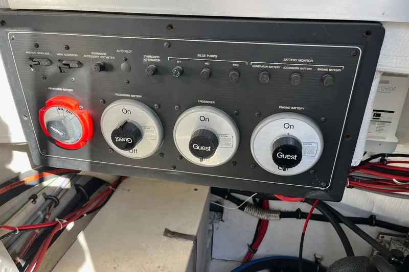 Slide: The Image of Control panel of a 1989 Bayliner 3888 MY Sedan boat with battery switches. - 24