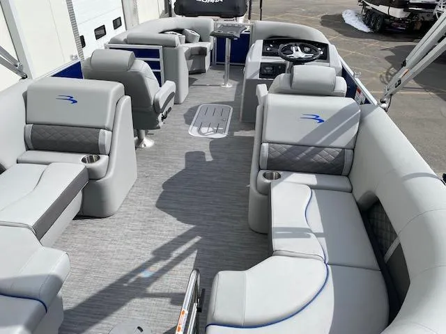 Slide: The Image of 2023 Bennington 22LFB pontoon boat interior with luxurious seating and modern design. - 5